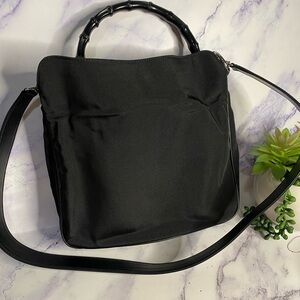 Casual Black Gucci Women's Crossbody Bag with Bamboo Handle.